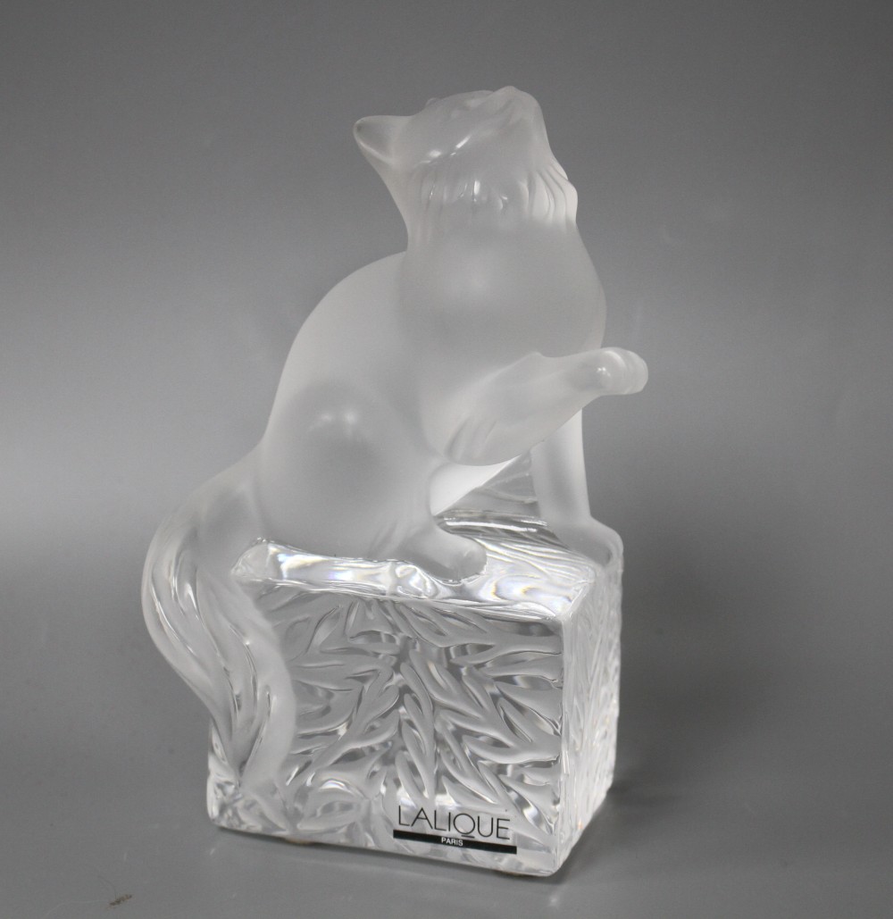 A modern Lalique frosted glass paperweight modelled as a seated cat, height 14.5cm, in original cardboard box,